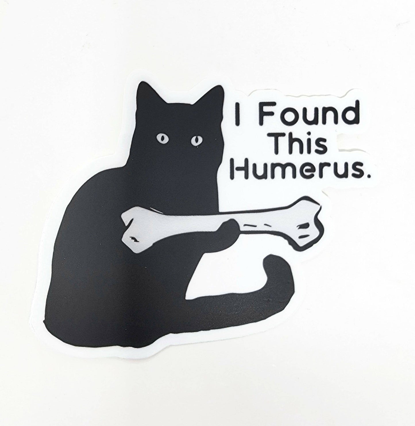 Candlelit Desserts - Vinyl Sticker - I Found This Humerus Cat with Bone